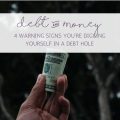 4 WARNING SIGNS YOURE DIGGING YOURSELF IN A DEBT HOLE